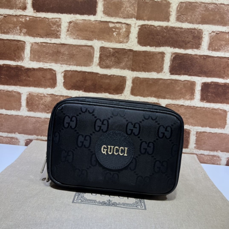 G*u*i clutch bags